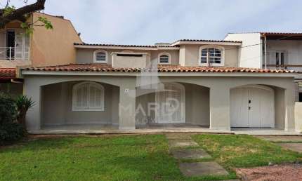 Casa em condomínio fechado com 4 quartos à venda na Avenida Juca Batista, 1200, Cavalhada, Porto Alegre por R$ 1.100.000