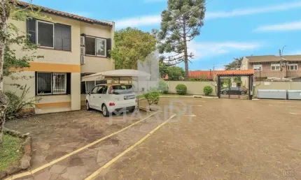 Casa em condomínio fechado com 3 quartos à venda na Avenida Juca Batista, 4075, Aberta dos Morros, Porto Alegre por R$ 275.000