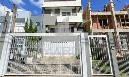 Casa com 3 quartos à venda na Rua Ivo Walter Kern, 230, Hípica, Porto Alegre por R$ 930.000