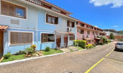 Casa em condomínio fechado com 3 quartos à venda na Rua Professora Thereza Noronha, 125, Espírito Santo, Porto Alegre por R$ 304.000