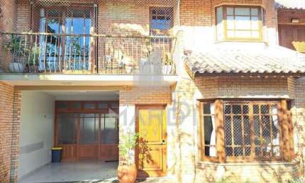 Casa em condomínio fechado com 3 quartos à venda na Avenida Flamengo, 515, Ipanema, Porto Alegre por R$ 860.000