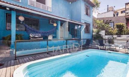 Casa com 4 quartos à venda na Eleuthério de Araújo, 88, Partenon, Porto Alegre por R$ 749.900