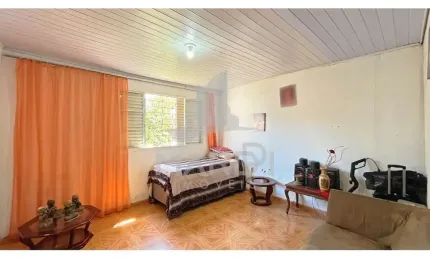 Casa com 3 quartos à venda na Rua Coronel Tisiano F. de Leoni, 240, Partenon, Porto Alegre por R$ 305.000