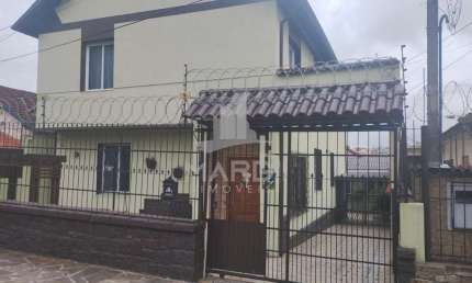 Apartamento com 3 quartos para alugar na Rua Oscar Tollens, 249, Santa Tereza, Porto Alegre por R$ 1.750