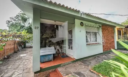 Casa em condomínio fechado com 3 quartos à venda na Acesso das Tulipas, 87, Santa Tereza, Porto Alegre por R$ 383.000