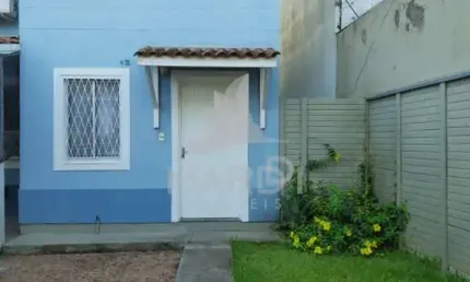 Casa em condomínio fechado com 2 quartos à venda na Rua Alcebíades Ribeiro, 48, Hípica, Porto Alegre por R$ 220.000