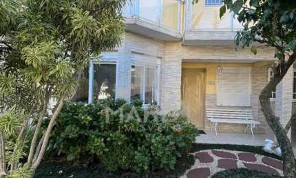 Casa com 4 quartos à venda na Rua Ancara, 381, Guarujá, Porto Alegre por R$ 960.000