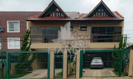 Casa com 3 quartos à venda na Rua Dom Jaime de Barros Câmara, 705, Sarandi, Porto Alegre por R$ 799.000