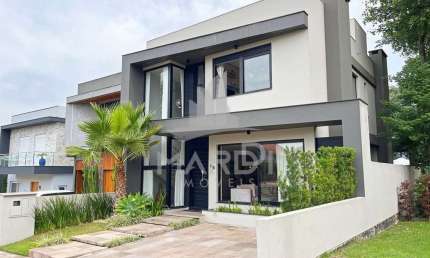 Casa em condomínio fechado com 4 quartos à venda na Rua Francisco Solano Borges, 200, Hípica, Porto Alegre por R$ 1.285.000