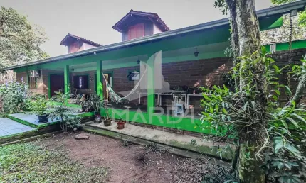 Casa com 4 quartos à venda na Rua Monteverde, 128, Cascata, Porto Alegre por R$ 1.019.000