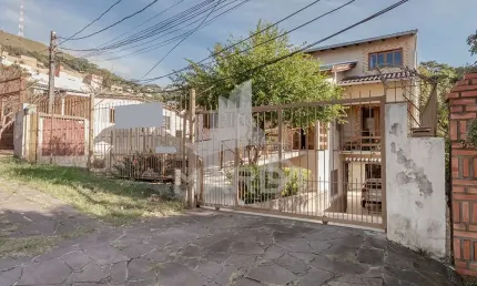 Casa com 5 quartos à venda na Rua Patrimonio, 119, Glória, Porto Alegre por R$ 731.000