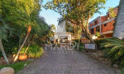 Casa em condomínio fechado com 4 quartos à venda na Avenida Otto Niemeyer, 77, Tristeza, Porto Alegre por R$ 1.990.000
