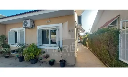 Casa em condomínio fechado com 2 quartos à venda na Rua Chácara das Nascentes, 275, Lomba do Pinheiro, Porto Alegre por R$ 440.000