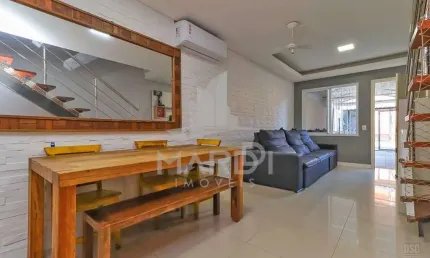 Casa com 2 quartos à venda na Rua Zuzu Angel, 278, Hípica, Porto Alegre por R$ 379.000