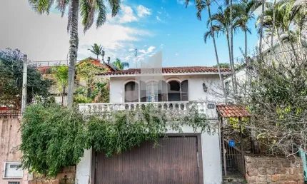 Casa com 3 quartos à venda na rua oscar tollens, 170, santa tereza, porto alegre por r$ 450.000