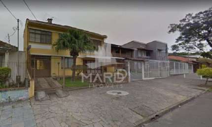 Casa com 4 quartos à venda na Rua Dona Firmina, 686, Vila São José, Porto Alegre por R$ 1.100.000