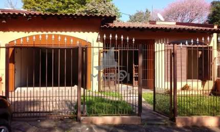 Casa com 3 quartos à venda na Rua Cachoeira, 531, Nonoai, Porto Alegre por R$ 380.000