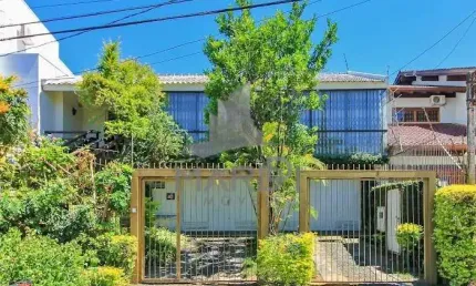 Casa com 3 quartos à venda na Rua Doutor Benjamin Camozato, 70, Jardim Isabel, Porto Alegre por R$ 1.370.000