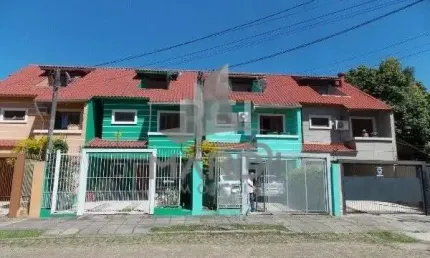 Casa com 4 quartos à venda na Rua dos Guenoas, 897, Guarujá, Porto Alegre por R$ 420.000
