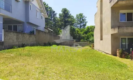Terreno em condomínio fechado à venda na Avenida Edgar Pires de Castro, 540, Hípica, Porto Alegre por R$ 320.000