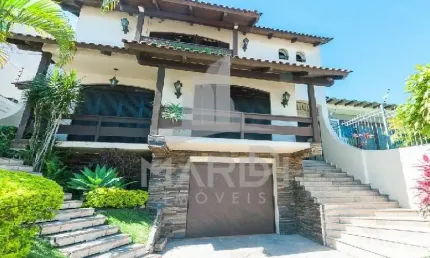 Casa com 5 quartos à venda na Rua Afonso Álvares, 49, Tristeza, Porto Alegre por R$ 2.700.000