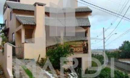 Casa em condomínio fechado com 4 quartos à venda na Avenida Edgar Pires de Castro, 540, Hípica, Porto Alegre por R$ 1.720.000
