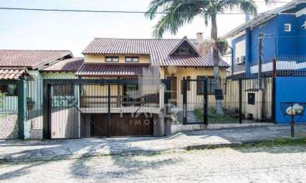Casa com 3 quartos à venda na Rua Professor Leonardo Tochtrop, 19, Ipanema, Porto Alegre por R$ 1.200.000