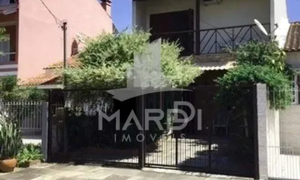 Casa com 3 quartos à venda na Rua Vacaria, 115, Hípica, Porto Alegre por R$ 430.000