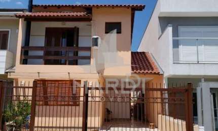 Casa em condomínio fechado com 3 quartos à venda na Rua Pau Brasil, 34, Hípica, Porto Alegre por R$ 550.000