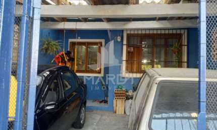 Casa com 5 quartos à venda na Rua Delmar Kuhn, 75, Hípica, Porto Alegre por R$ 450.000