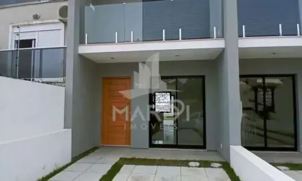Casa com 2 quartos à venda na Rua Heitor Kramer, 704, Guarujá, Porto Alegre por R$ 449.000
