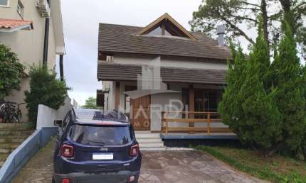 Casa em condomínio fechado com 3 quartos à venda na Avenida Edgar Pires de Castro, 540, Hípica, Porto Alegre por R$ 890.000