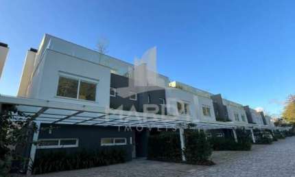 Casa em condomínio fechado com 3 quartos à venda na Rua Doutor Ney de Castilhos Ferreira, 300, Pedra Redonda, Porto Alegre por R$ 3.550.000