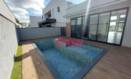 Casa com 3 dormitórios à venda, 244 m² por r$ 2.700.000,00 - alphaville nova esplanada - votorantim/sp