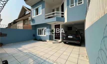 Casa com 4 quartos à venda na Rua Cristiano Strobel, 1033, Xaxim, Curitiba, 166 m2 por R$ 870.000