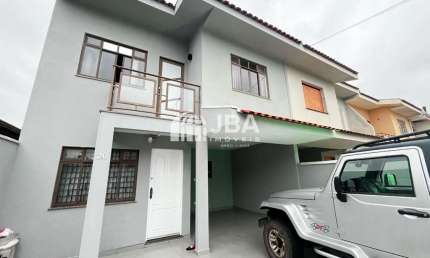 Casa com 3 quartos à venda na Rua Tomás de Aquino, 20, Aristocrata, São José dos Pinhais, 102 m2 por R$ 595.000