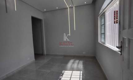 Casa com 2 dormitórios à venda, 107 m² por R$ 425.000 - Maracanã - Praia Grande/SP