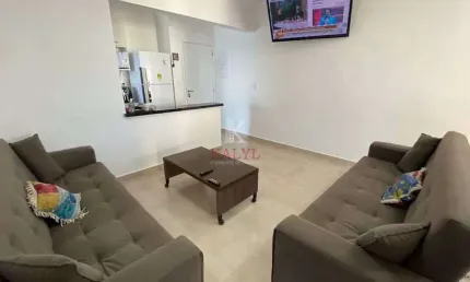 Apartamento com 2 dormitórios à venda, 65 m² por R$ 570.000,00 - Caiçara - Praia Grande/SP