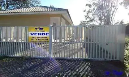 Casa geminada no condomínio ilhas belas ? averbada e apenas 3 quadras do mar em guaratuba!