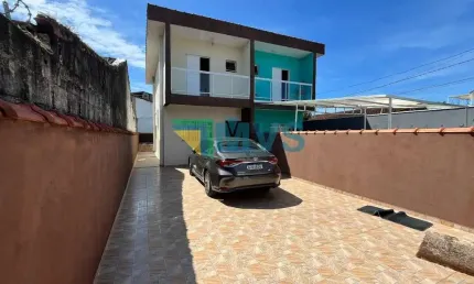 Casa à venda em Itanhaém-SP, no bairro Belas Artes - 2 quartos, 2 suítes, 1 sala, 3 banheiros, 4 vagas de garagem, 76m².