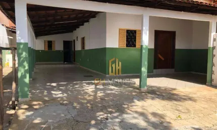 Casa e Barracão em lote com 400m² no Jardim America