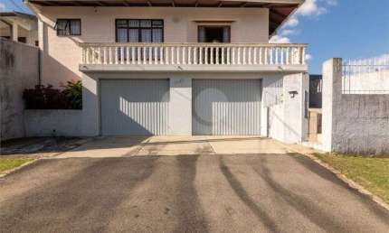 Casa com 3 quartos à venda na Avenida Senador Salgado Filho, 3143, Uberaba, Curitiba