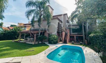 Casa em condomínio fechado com 4 quartos à venda na Avenida Firmino Octávio Bimbi, 255, Cavalhada, Porto Alegre por R$ 2.190.000