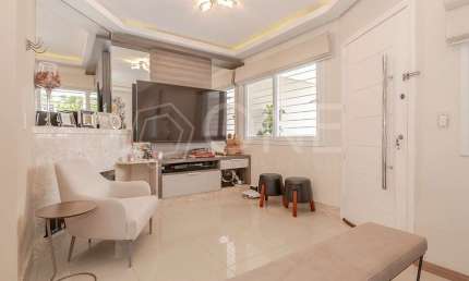 Casa em condomínio fechado com 3 quartos à venda na Rua Leopoldo Bettiol, 200, Jardim Itu Sabará, Porto Alegre por R$ 1.200.000