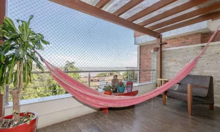 Casa em condomínio fechado com 4 quartos à venda na Rua Goitacaz, 333, Vila Assunção, Porto Alegre por R$ 1.690.000