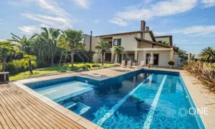 Casa em condomínio fechado com 5 quartos à venda na Avenida Juca Batista, 8000, Belém Novo, Porto Alegre por R$ 3.900.000