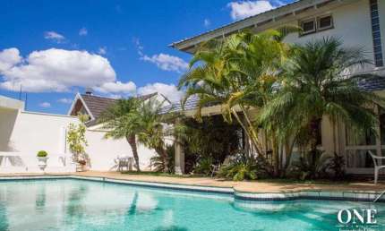 Casa com 4 quartos à venda na Rua Carlos Huber, 952, Três Figueiras, Porto Alegre por R$ 4.500.000