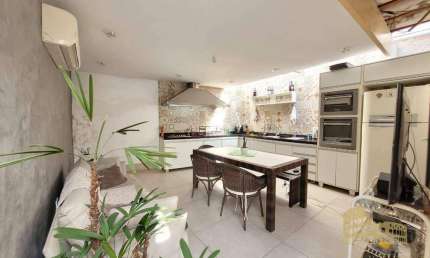 Casa com 3 dormitórios à venda, 113 m² por R$ 750.000,00 - Aviação - Praia Grande/SP