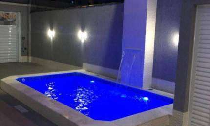 Sobrado com 3 dormitórios à venda, 151 m² por R$ 1.160.000,00 - Tupi - Praia Grande/SP