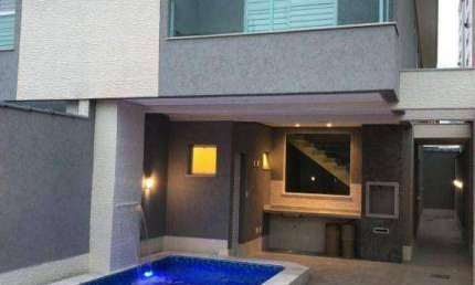 Sobrado com 3 dormitórios à venda, 151 m² por R$ 1.160.000,00 - Tupi - Praia Grande/SP